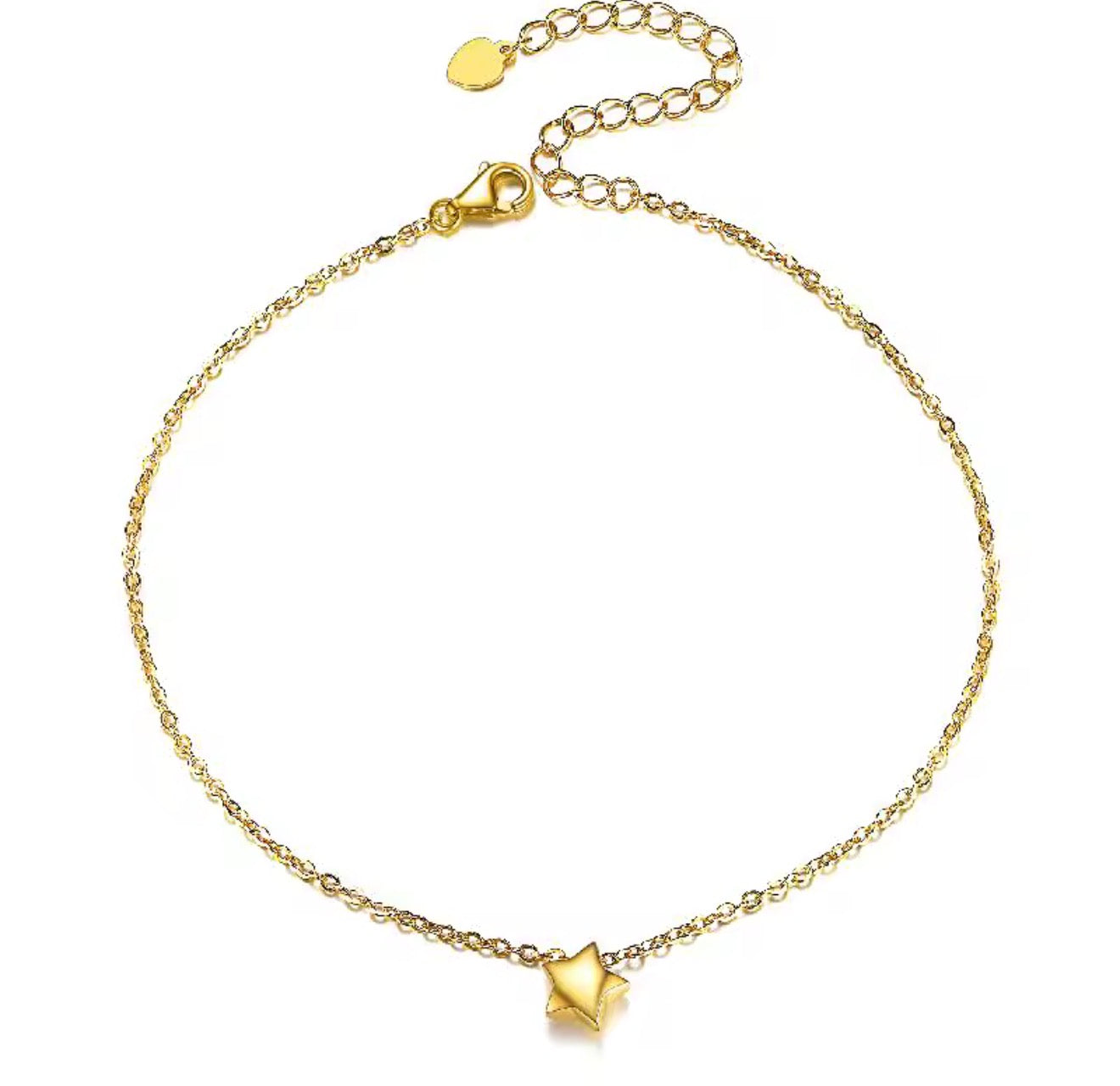 Gold anklet with a star-shaped charm on a white background